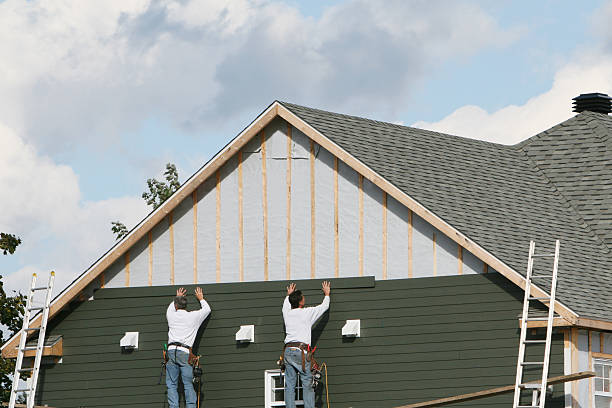 Professional Storm Damage Siding Repair technician working in Hudgins, VA